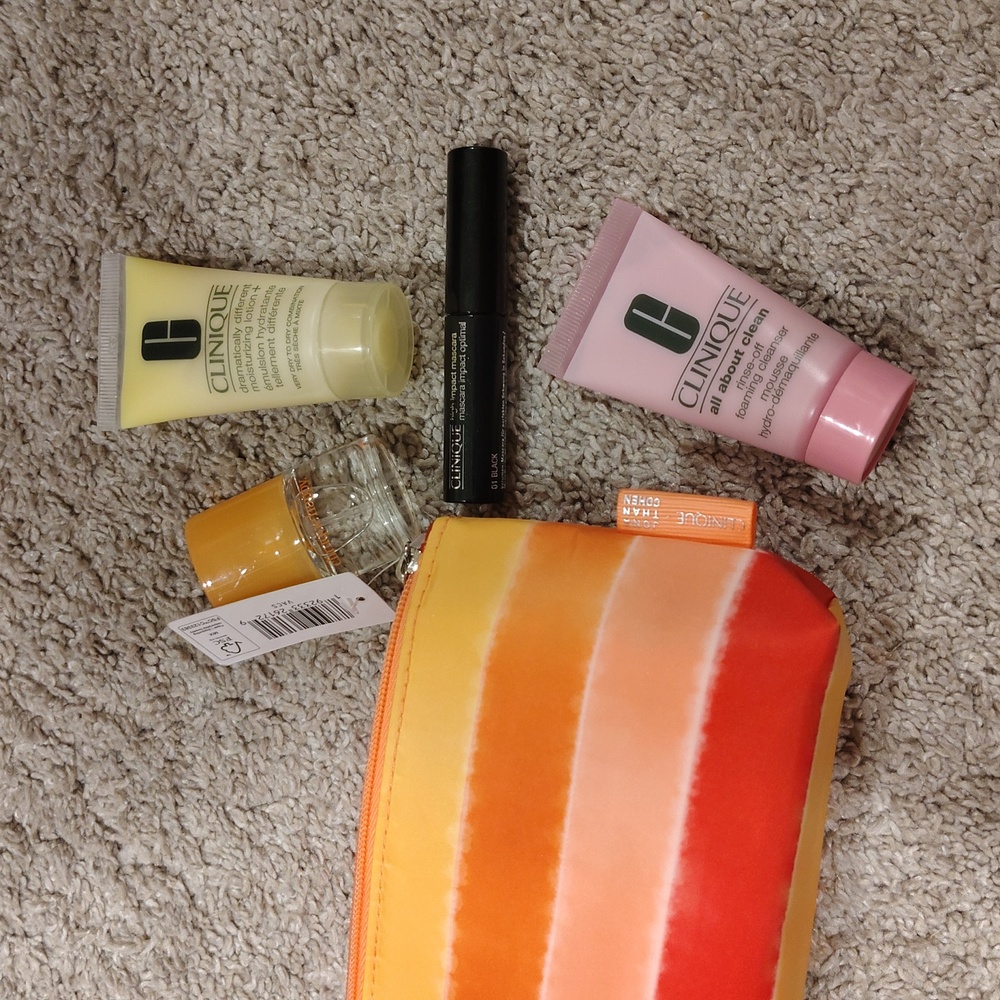 Clinique Primer Set with Orange and Pink Pouch. Has Deluxe Samples.